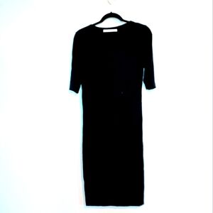 Diane Von Furstenberg black lined dress with stretchy fabric, midi length with s